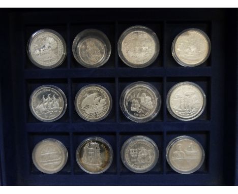 Twelve silver commemorative Ships and Explorers crown sized etc coins in a collector's case, to include First Sighting of the