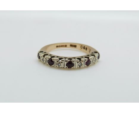 A 9ct gold half eternity ring set with diamonds and rubies, 3.3g, size K/L