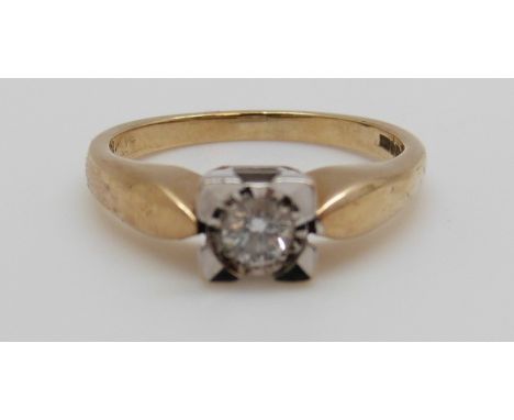 A 9ct gold ring set with a diamond of approximately 0.15ct in a square setting (size J)