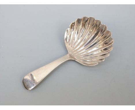 A George III hallmarked silver tea caddy spoon of shell form London 1815, maker Edward Lees length 8cm