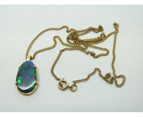 A 9ct gold necklace set with a black opal on a 9ct gold chain, 4.6g