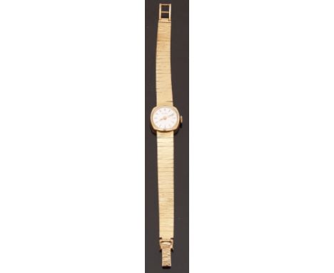 Eterna 9ct gold ladies wristwatch with two-tone hands and baton markers and silvered face, on integral 9ct gold bracelet, cas