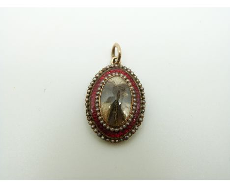 A Victorian pendant set with plaited hair to the centre surrounded by red guilloche enamel bordered by two rows of seed pearl