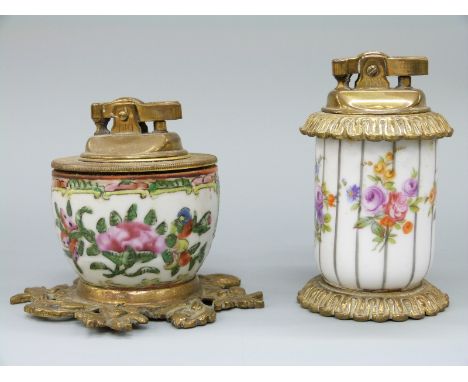 A late 19th/20thC Chinese porcelain table lighter with brass Tiki mechanism and a similar French porcelain example, tallest 1