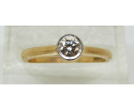 An 18ct gold ring set with a round cut diamond of approximately 0.23ct, 3.47g (size M)