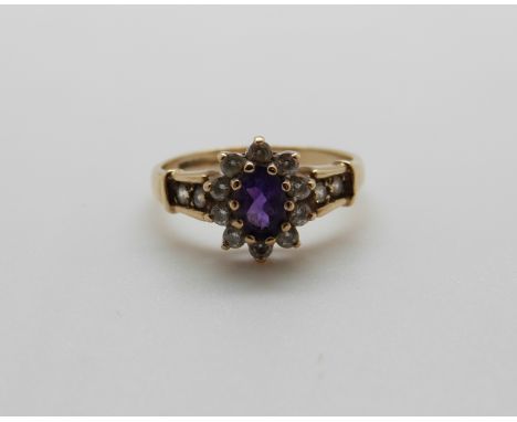 A 9ct gold ring set with an amethyst, 2.2g, size L/M  