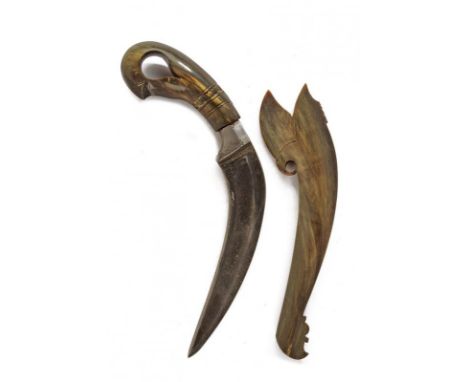 dating: early 20th Century provenance: Sumatra, Very curved, single-and false-edged blade with double groove. Horn, embossed 