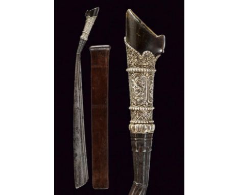 dating: 19th Century provenance: Kalimantan, Strong, single-edged blade, enlarged toward the foible, with double groove near 