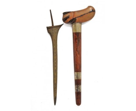dating: Late 19th Century provenance: Giava, Smooth double-edged blade, in fine pamor. No ukiran nor mendak. Wooden warangka 