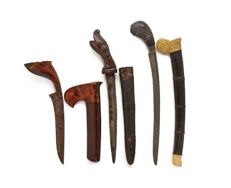 dating: Late 19th Century provenance: Sumatra, All with blades in pamor. Wooden grips, partially embossed. All with scabbard,