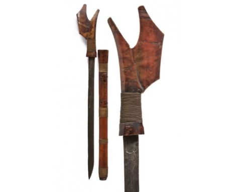 dating: Second half of the 19th Century provenance: Sulawesi, Straight, single-edged blade, in fine pamor. Wooden, embossed g
