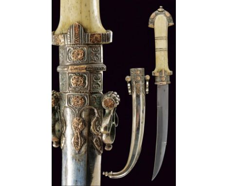 dating: circa 1900 provenance: Morocco, Typical, smooth-bore, sinlge-and false-edged blade. Bone grip. Silver mounts with gol