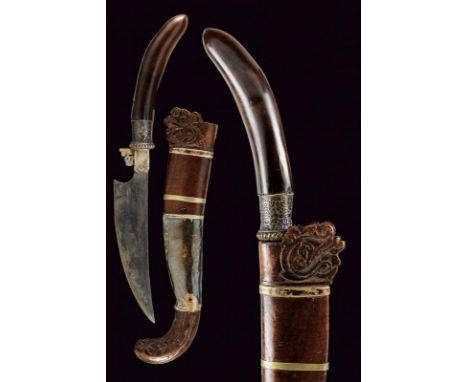 dating: 19th Century provenance: Sumatra, Strong, curved, single-edged blade, with remains of engravings. Horn grip with ring