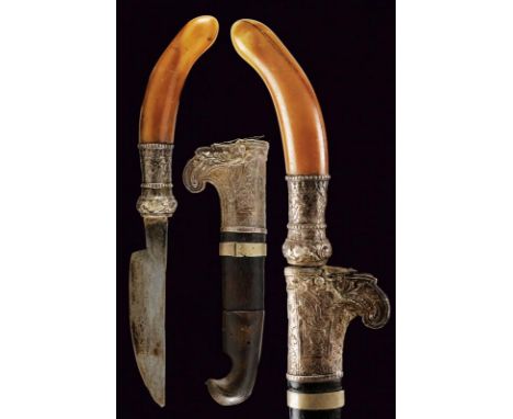 dating: last quarter of the 19th Century provenance: Sumatra, Curved, single-edged blade, with narrow base. Ivory grip with w