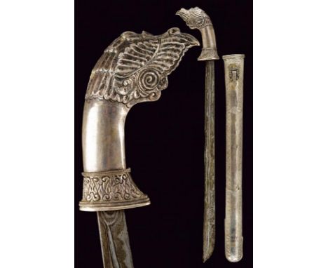 dating: Late 19th Century provenance: Giava, Straight, single-edged blade, in pamor. Grip and scabbard covered with silver fo