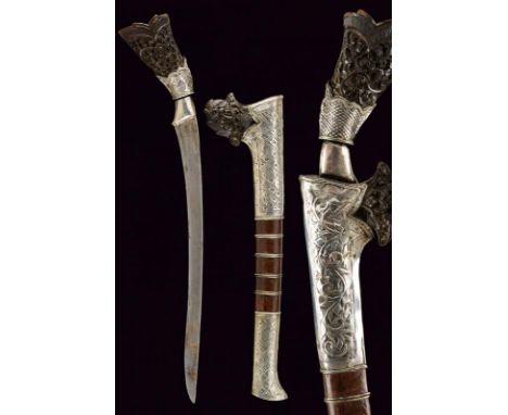 dating: Late 19th Century provenance: Sumatra, Slightly curved, single-edged blade, in pamor, with small groove at the forte.