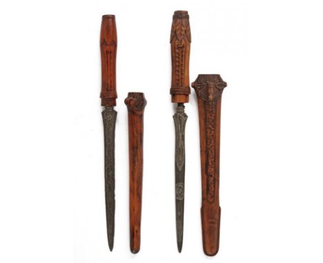 dating: 17th/18th Century provenance: Giava, Straight, smooth double-edged blades, in fine pamor. Both with wooden grips and 