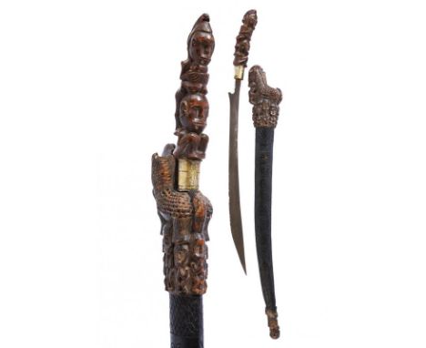 dating: First half of the 20th Century provenance: Sumatra, Curved, single-edged blade, with chiselled base, wooden grip, emb