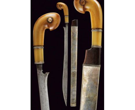 dating: 19th Century provenance: Sumatra, Straight, single-edged blade, base with curl and narrow tang. Fine, horn grip with 