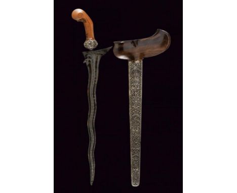 dating: First half of the 20th Century provenance: Giava, Undulated double-edged blade, in fine pamor, with chiselled base, p