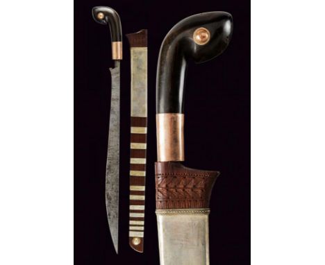 dating: 19th Century provenance: Sumatra, Straight, single-edged blade with curl at the base and narrow tang. Horn grip with 