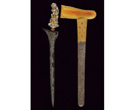 dating: circa 1900 provenance: Kadutan, Straight, smooth double-edged blade, in fine pamor, with short groove at the forte. U