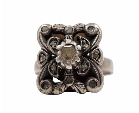 Silver and 14 kt gold Ring, set with diamonds in an antique finish, the ring consists of a joined silver hoop that was attach