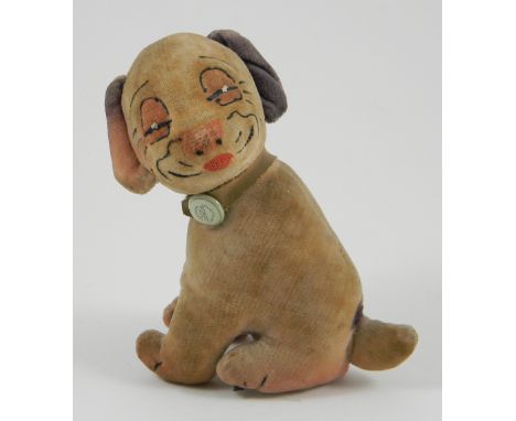 Chad Valley Bonzo soft toy, English 1920’s, the seated dog with printed features, black patch above tail and black ear, leath