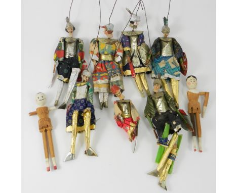 Seven Sicilian puppet Knights, 1920’s, all having moulded composition heads with helmets, painted features, metal body armour