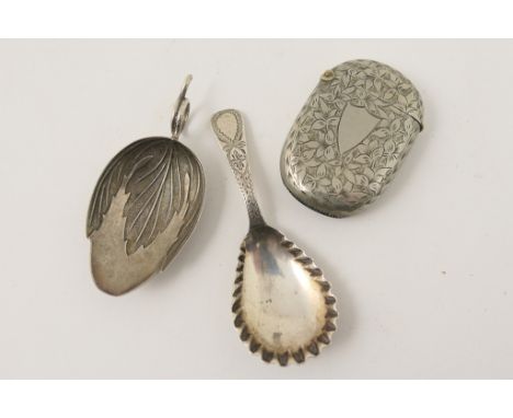 Victorian silver plated vesta case; also a white metal leaf form tea caddy spoon; and a further white metal caddy spoon marke