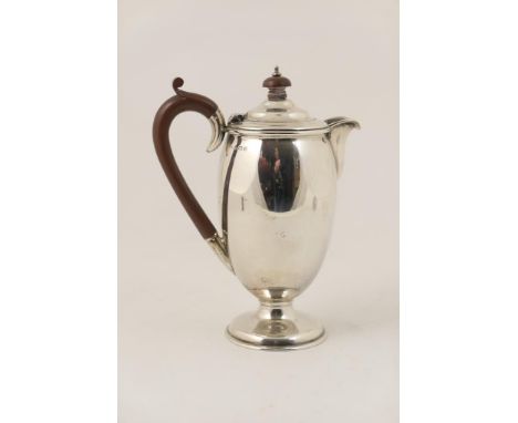 George V silver hot water jug, Birmingham 1930, ovoid form with wooden finial and handle, height 21cm, gross weight approx. 4