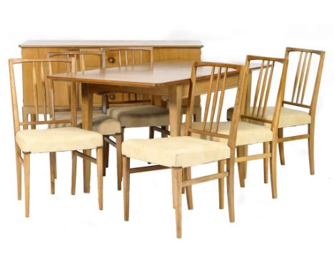 Gordon Russell walnut dining room suite, 1950s, comprising an extending dining table with one additional leaf, length closed 