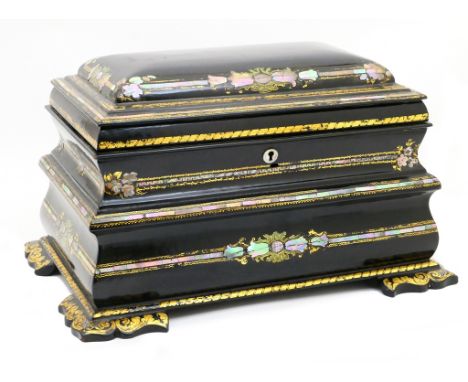 Victorian black lacquered papier mache tea caddy, circa 1850, sarcophagus form inlaid with mother of pearl and with gilt foli