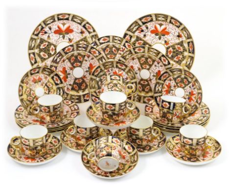 Royal Crown Derby Imari tea service, circa 1894, pattern number 2451, comprising nine cups, nine saucers, twelve side plates,