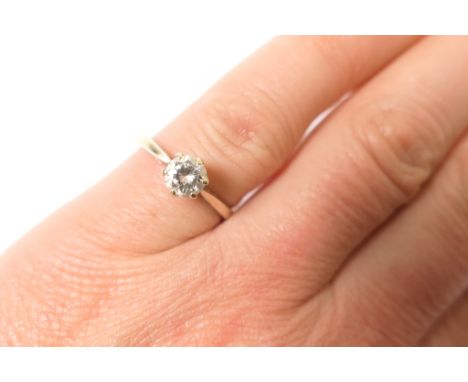 Diamond solitaire ring, brilliant cut stone of approx. 0.6ct, colour estimated as G/H and clarity as VS1/2, mounted in 18ct w