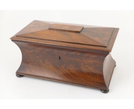 Regency mahogany sarcophagus tea caddy, circa 1820, waisted rectangular form with twin caddy interior and a central cut glass