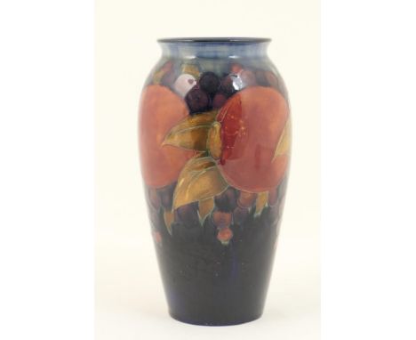 William Moorcroft Pomegranate vase, ovoid form with slightly everted neck, decorated with a deep cobalt blue ground, shading 