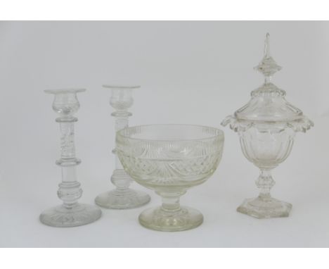 Pair of cut glass candlesticks in the Georgian style, with knopped and wrythen columns over a star cut circular base, 25.5cm;