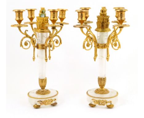 Pair of French rock crystal and gilt ormolu candelabra, late 19th Century, each having a central rock crystal torch column su