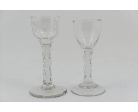 George III wine glass, circa 1785, ogee bowl engraved with a bird and floral sprig, over a faceted stem and conical foot, hei