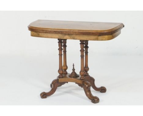 Victorian burr walnut card table, D-shaped top with figured veneers and boxwood line inlay swivelling opening to reveal green