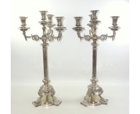 Fine pair of Regency style silver plated 4 light candelabra, each with straight gadrooned nozzles and drip pans, and 3 foliat