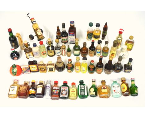 Miniatures -  A Grant's Scotch Whisky bottle presented in a 'Golf trolley', a variety of liqueurs and other drinks etc. (56)