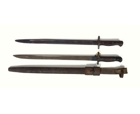 Lee Enfield SMLE 1907 pattern sword bayonet, by Wilkinson, the ricasso stamped WILKINSON with 11 18 date, and a similar bayon