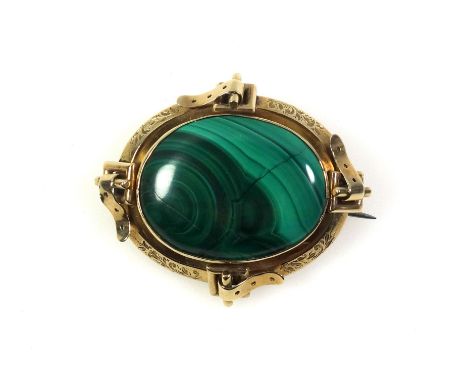 A late Victorian yellow metal and malachite oval memorial brooch, with a belt and buckle surround, inscribed 'E. G. from J. R