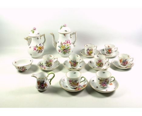 Herend, Hungary, porcelain coffee set with painted floral spray decoration under an osier moulded and gilt rim, comprising co
