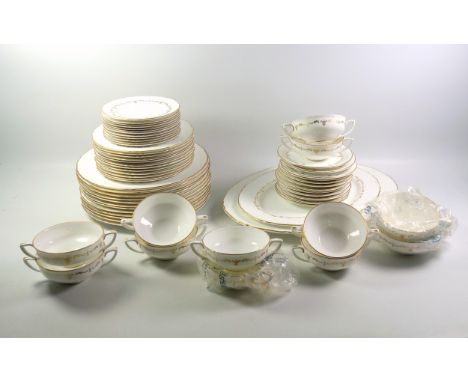 Royal Worcester bone china "Gold Chantilly" Pattern dinner service of 62 pieces, comprising 2 meat dishes, largest W.40.5cm; 