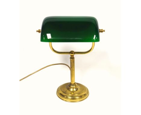 Brass banker's lamp with a green glass shade, and a stepped circular base, H.36cm approx.