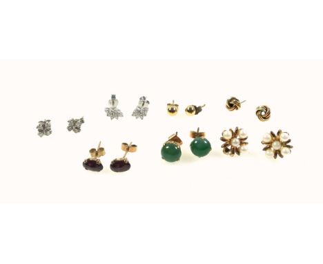 Pair of 18ct white gold stud earrings, each set 9 diamonds, 2.1grs; pair of 9ct white gold stud earrings, each set 4 diamonds