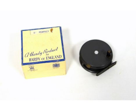 A Hardy ''Perfect'' 3 1/8 Fly Reel in card box. Right hand wind with ribbed brass foot and ebonite handle. Condition is very 